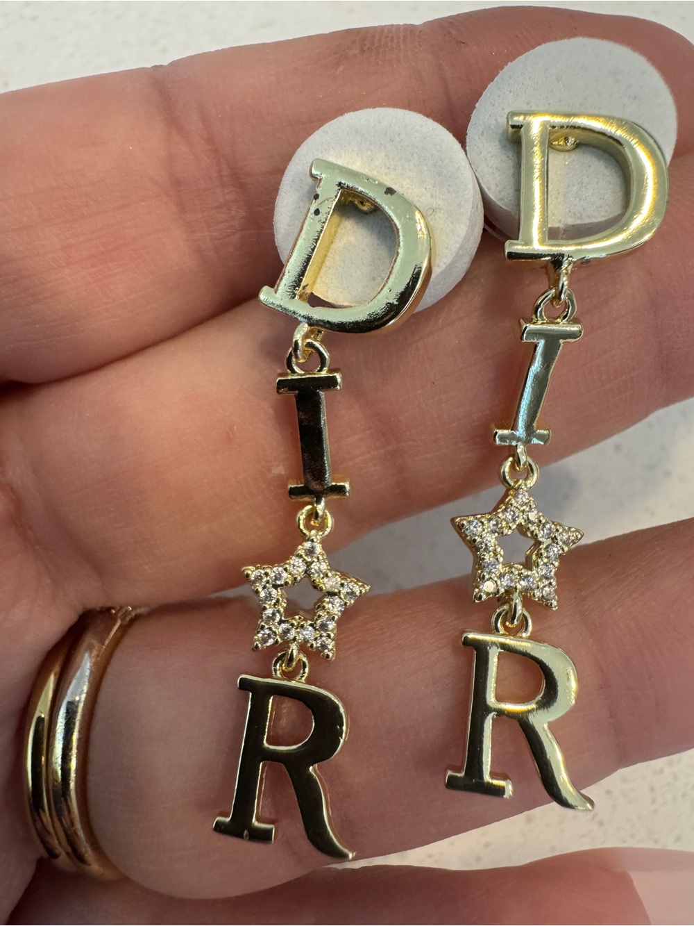 Gold-tone Drop Earrings with Pave Star Accent